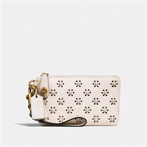 coach turnlock wristlet|Turnlock Wristlet 21 In Glovetanned Leather With Whipstitch.